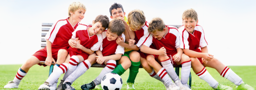 Laughing Kids with a football