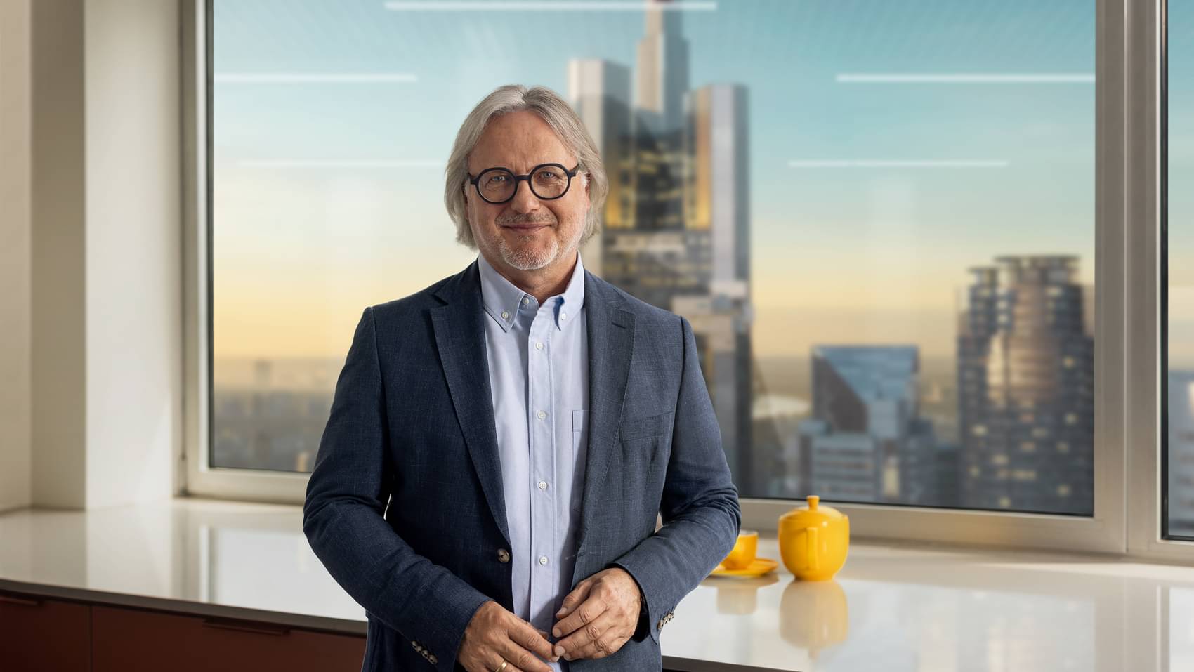 The picture shows Frank Schübel, CEO, TEEKANNE Group In the background you can see the Commerzbank Tower, Frankfurt