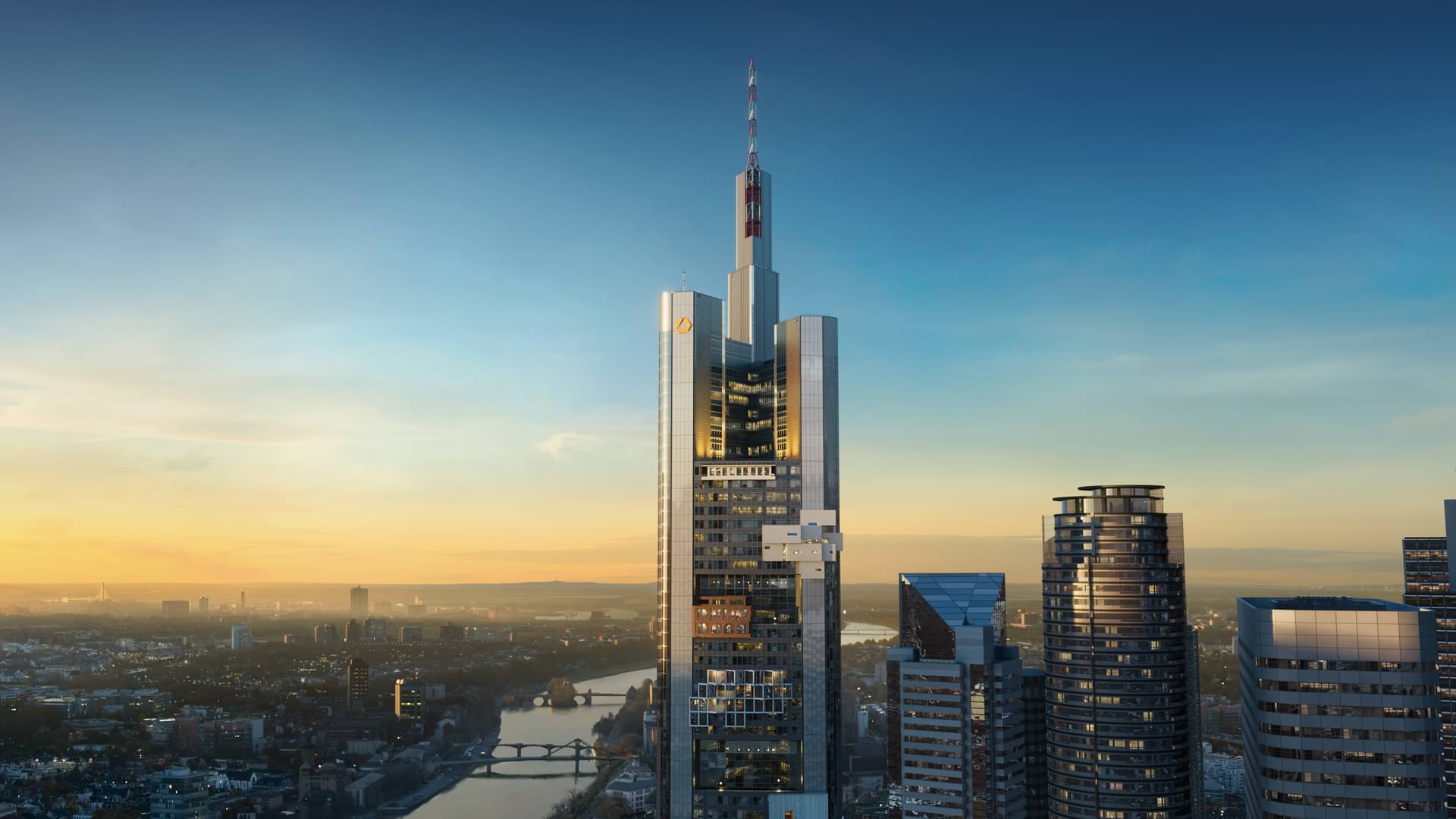 The image shows the Commerzbank Tower in Frankfurt from a bird's-eye view.